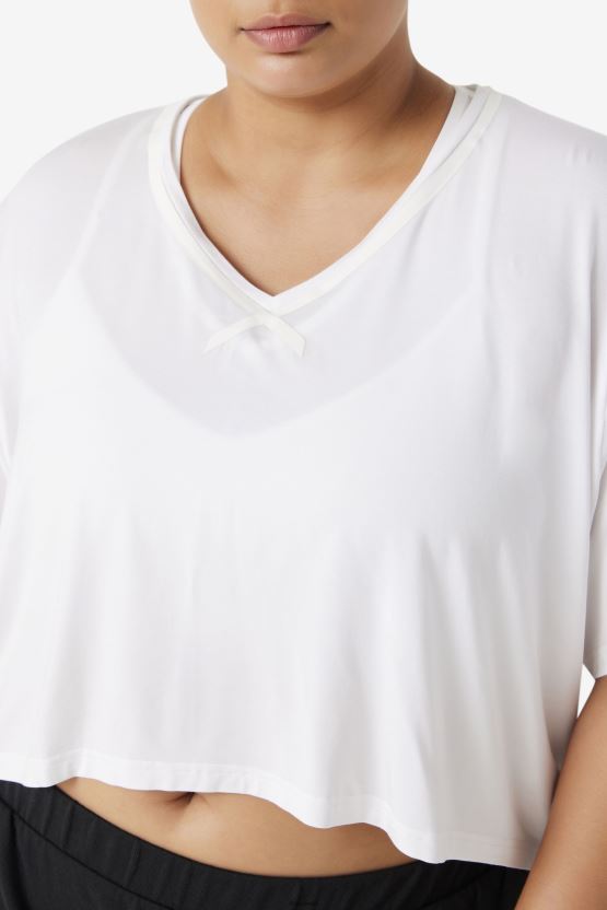 بلوزة بيضاء من Fila ذات قصّة عالية ومنخفضة من Fi-Lux BX00H41918 أبيض FILA
